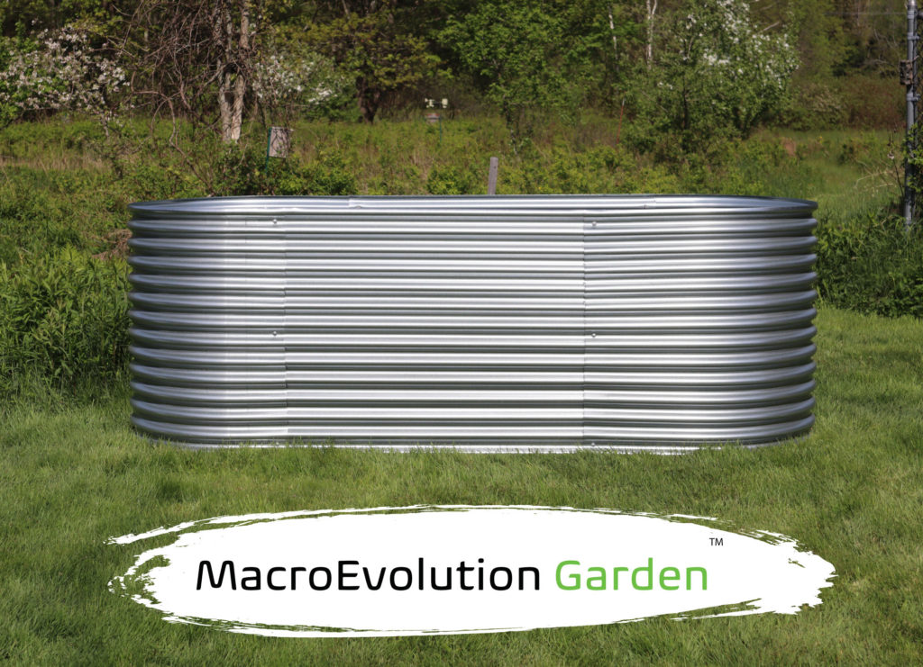 Extra large, tall elevated planter or raised garden bed, eight and a half feet long and 39 inches wide. Titled MacroEvolution Garden (Trademark).
